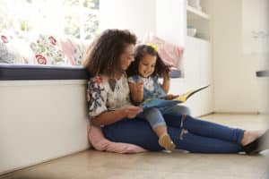 mom and daughter reading