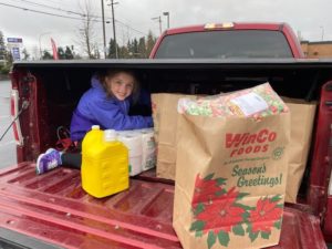 Ada loading groceries