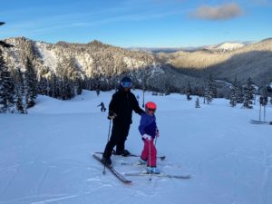 Nick skiing with daughter