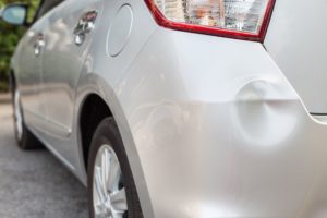 Dent in car bumper